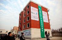 Современные жилые дома в Китае напечатали на 3D-принтере